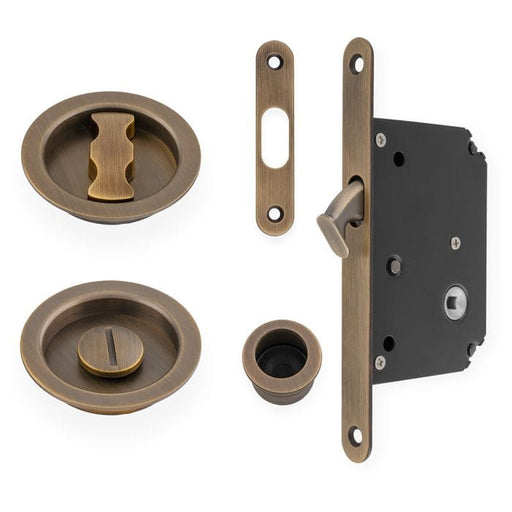 Alexander & Wilks Turn & Release Antique Brass Radius Sliding Door Lock Set