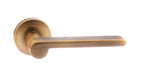 Atlantic Handles Weathered Antique Bronze Senza Pari Darrio Designer Lever on Round Rose