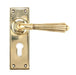 From The Anvil Handles Euro Lock Set Aged Brass Hinton Lever on Rose Set