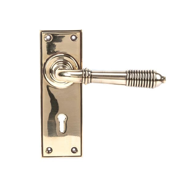 From The Anvil Handles Aged Brass Aged Brass Reeded Lever Lock Set