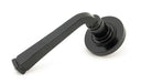 From The Anvil Handles Plain Black Avon Round Lever on Rose Set